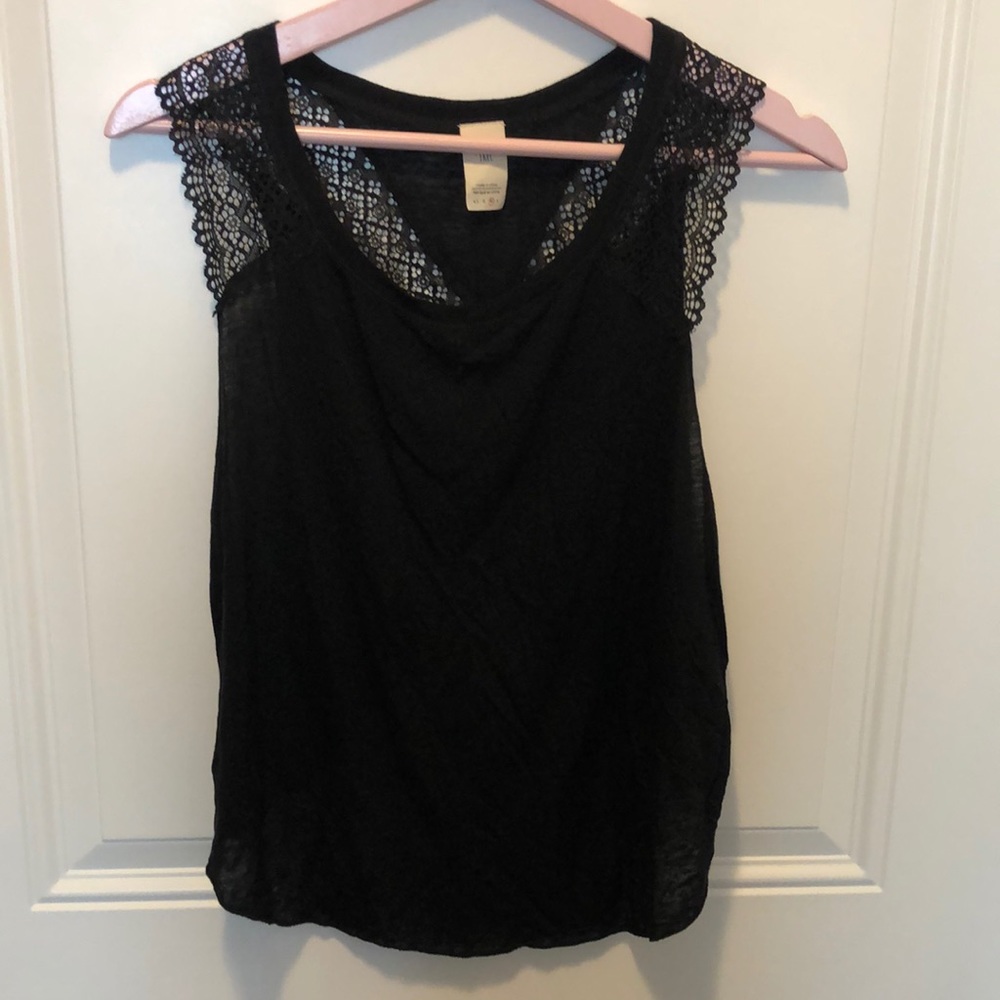 Pretty light weight black and lace top, cross back